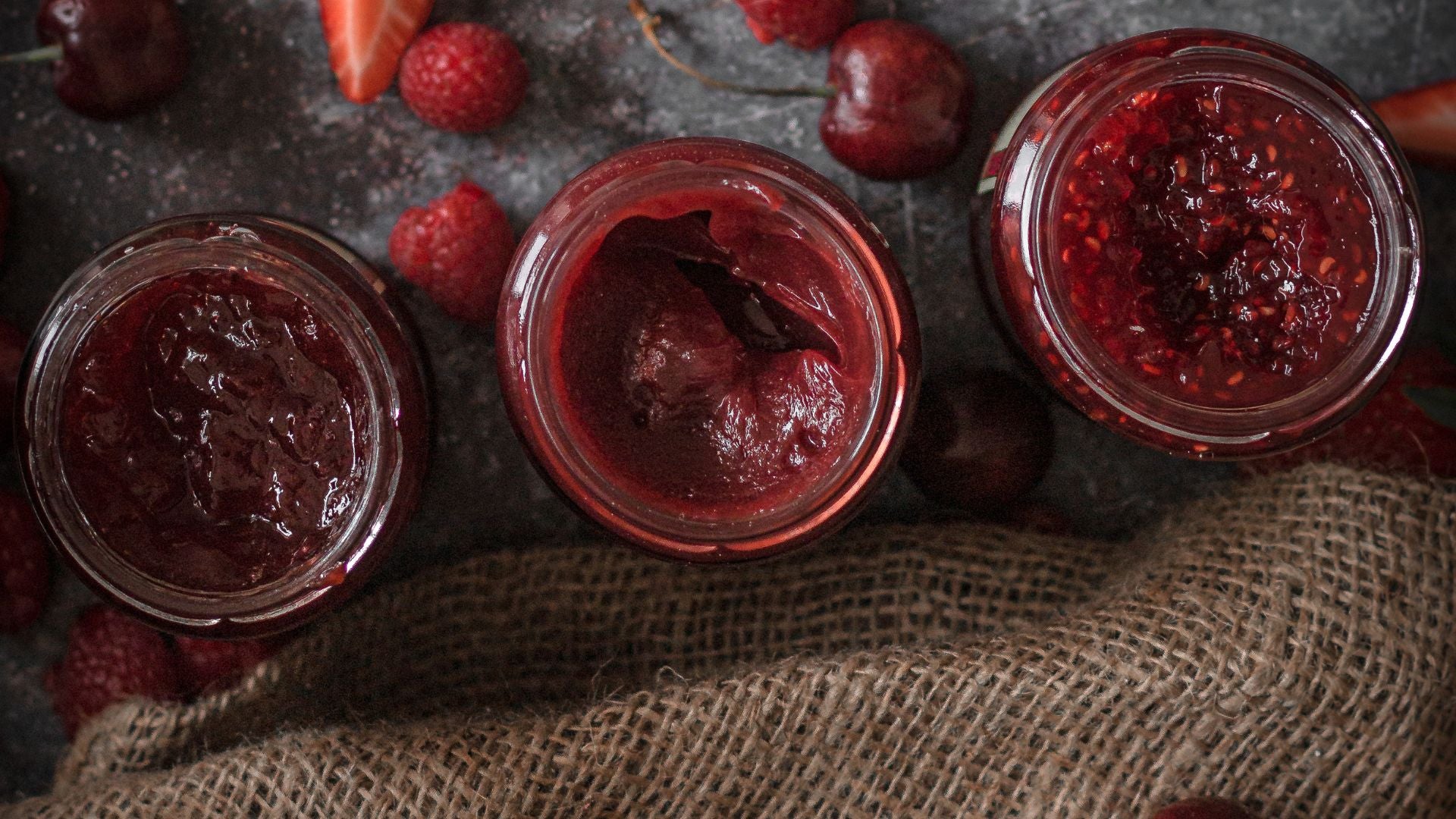 Three jars of thursday cottage jam from above 